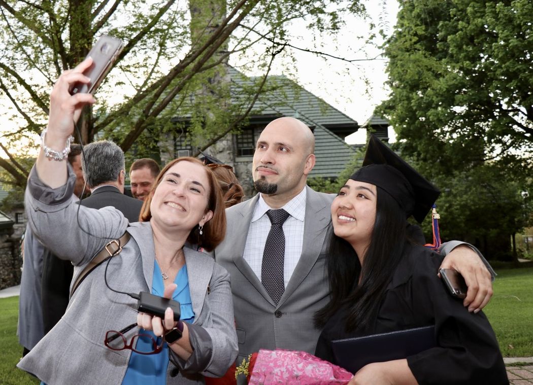IBM mentor Jamira Torres-Murphy takes a selfie of mentee, Suriana Rodriguez and Superintendent, Dr. Roberto Padilla.
