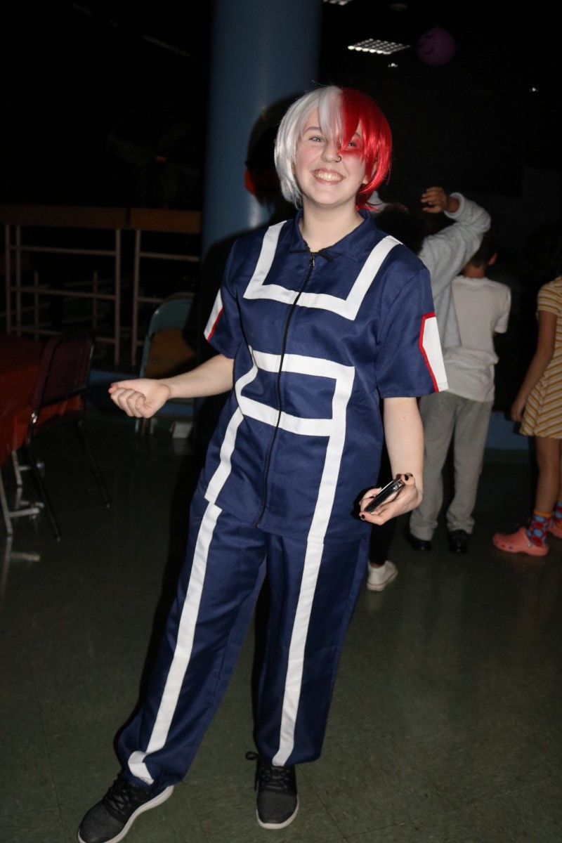 Students pose for a photo in their costume.