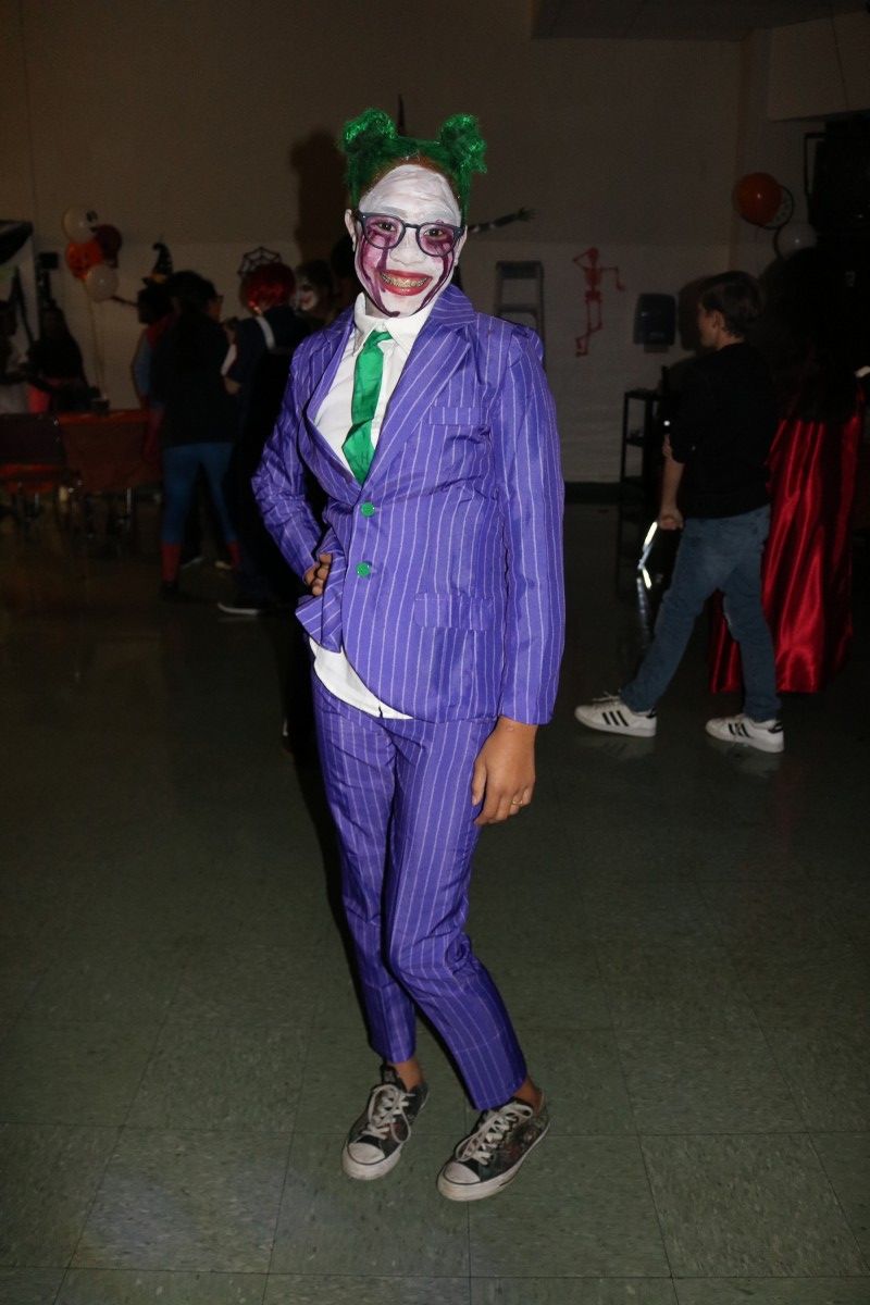 Students pose for a photo in their costume.