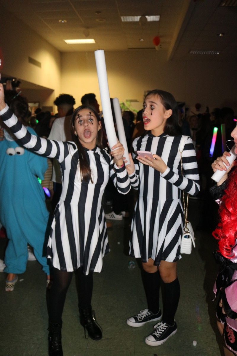 Students pose for a photo in their costume.