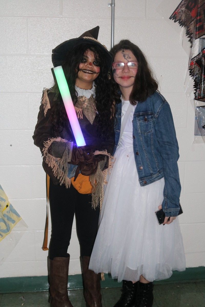 Students pose for a photo in their costume.