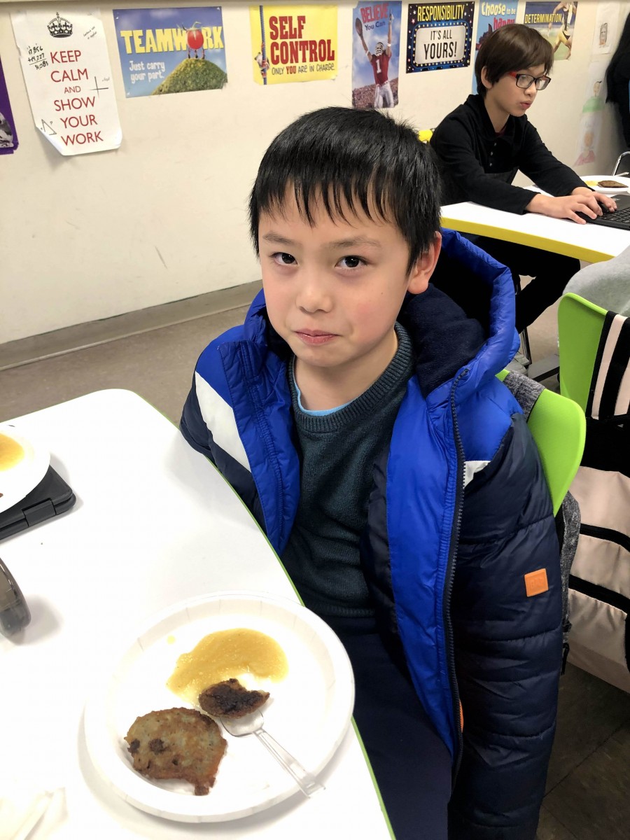 Student with plate of food.