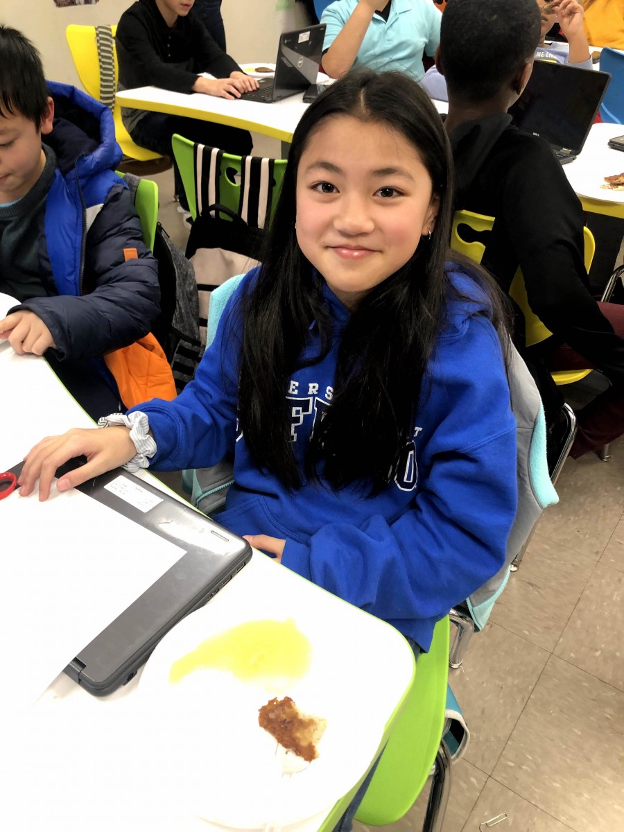 Student with plate of food.