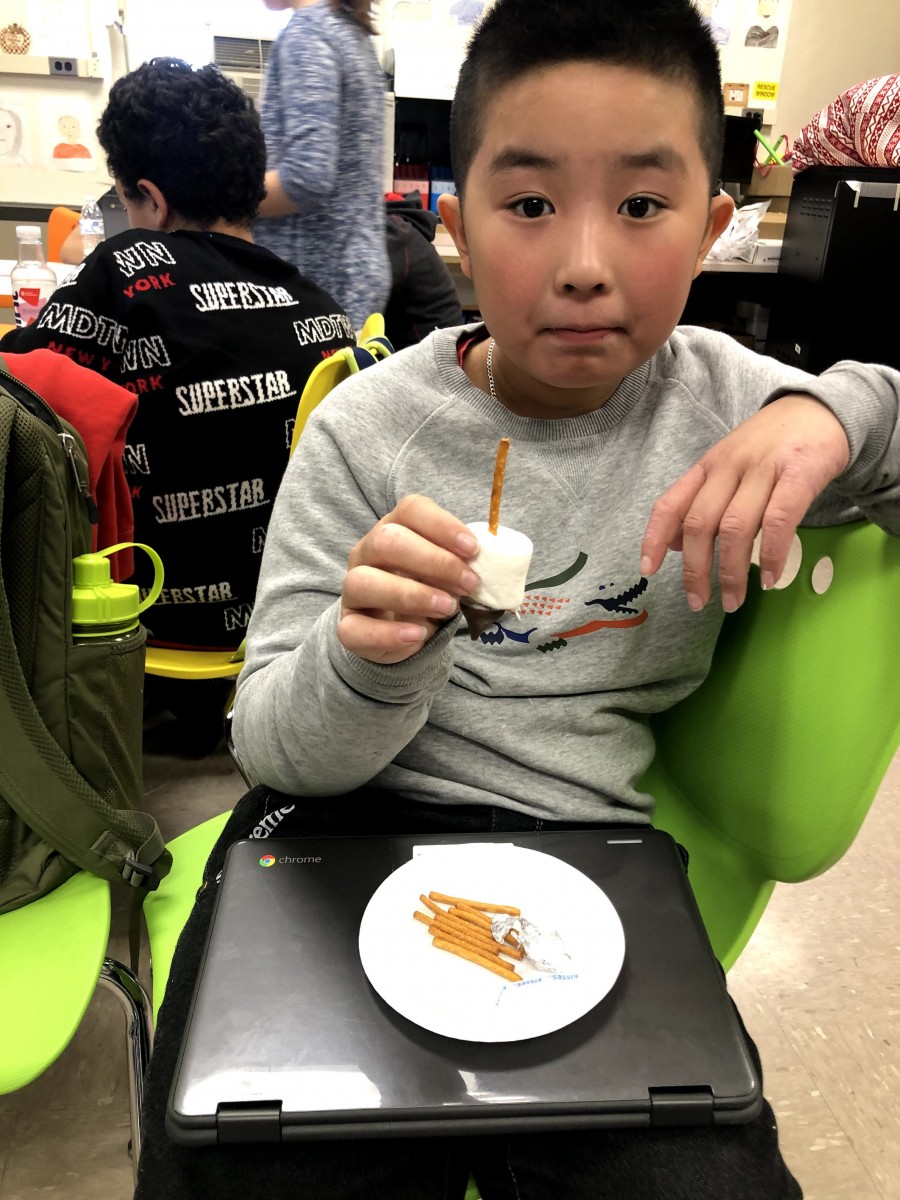 Student with plate of food.