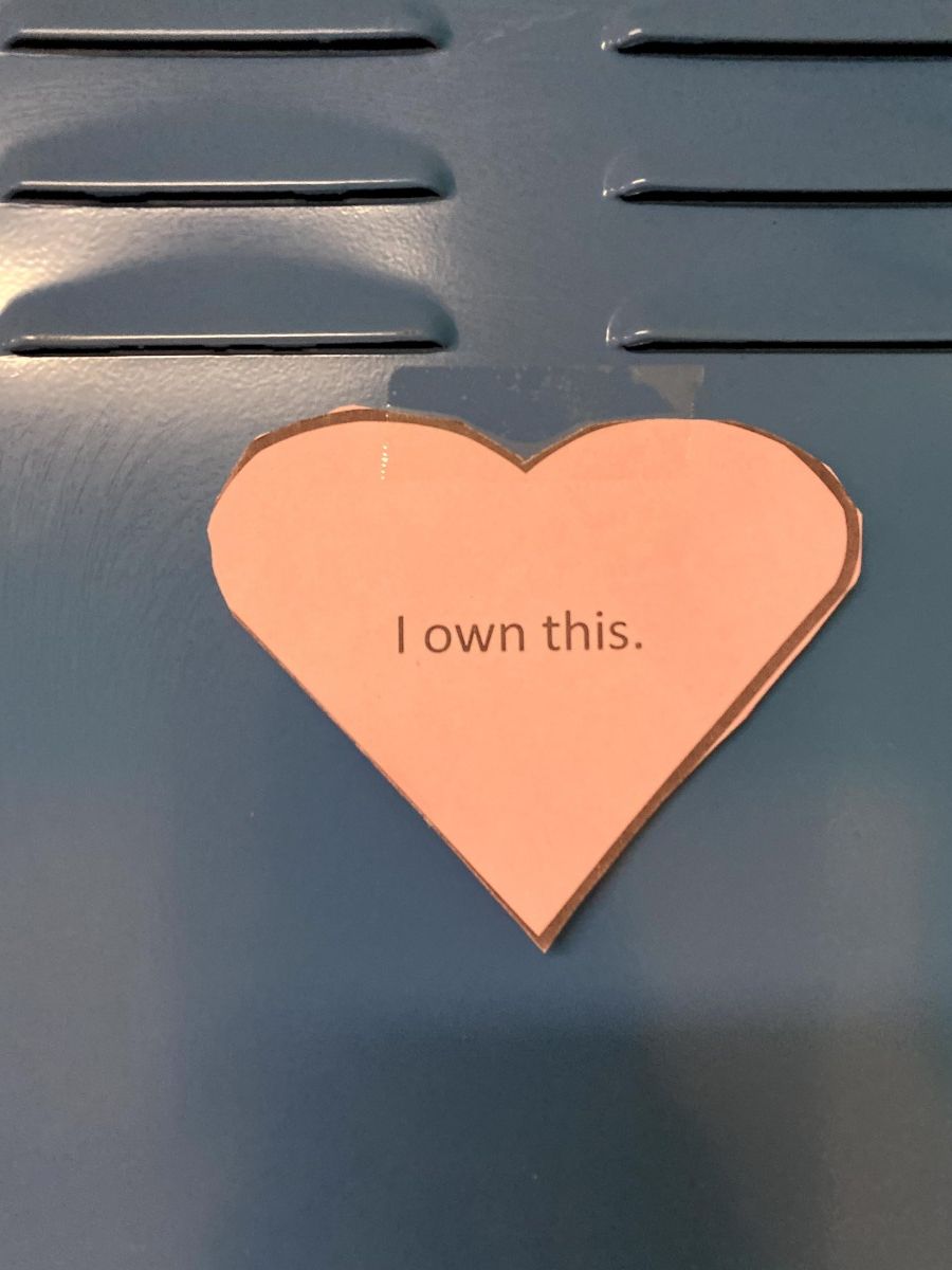 Affirmation in a heart stuck to a locker.