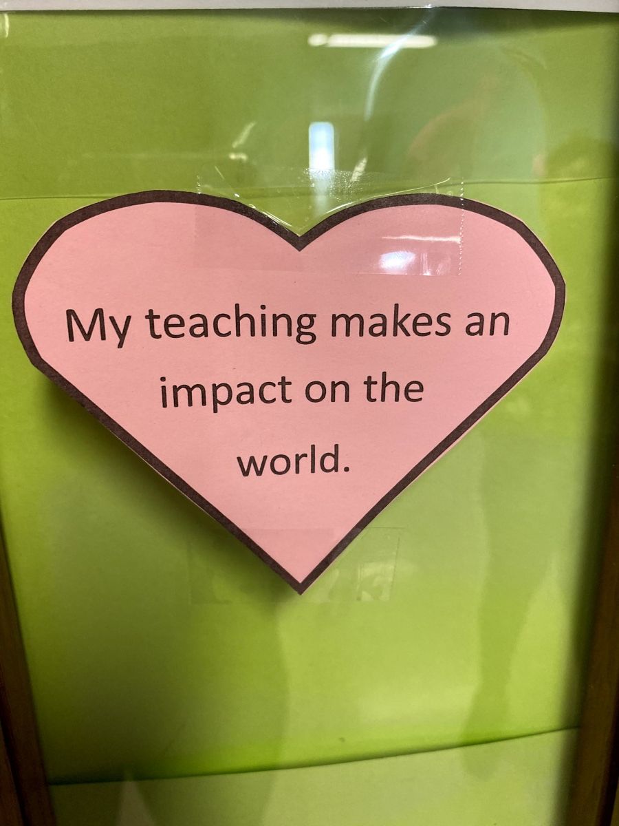 Affirmation in a heart stuck to a locker.