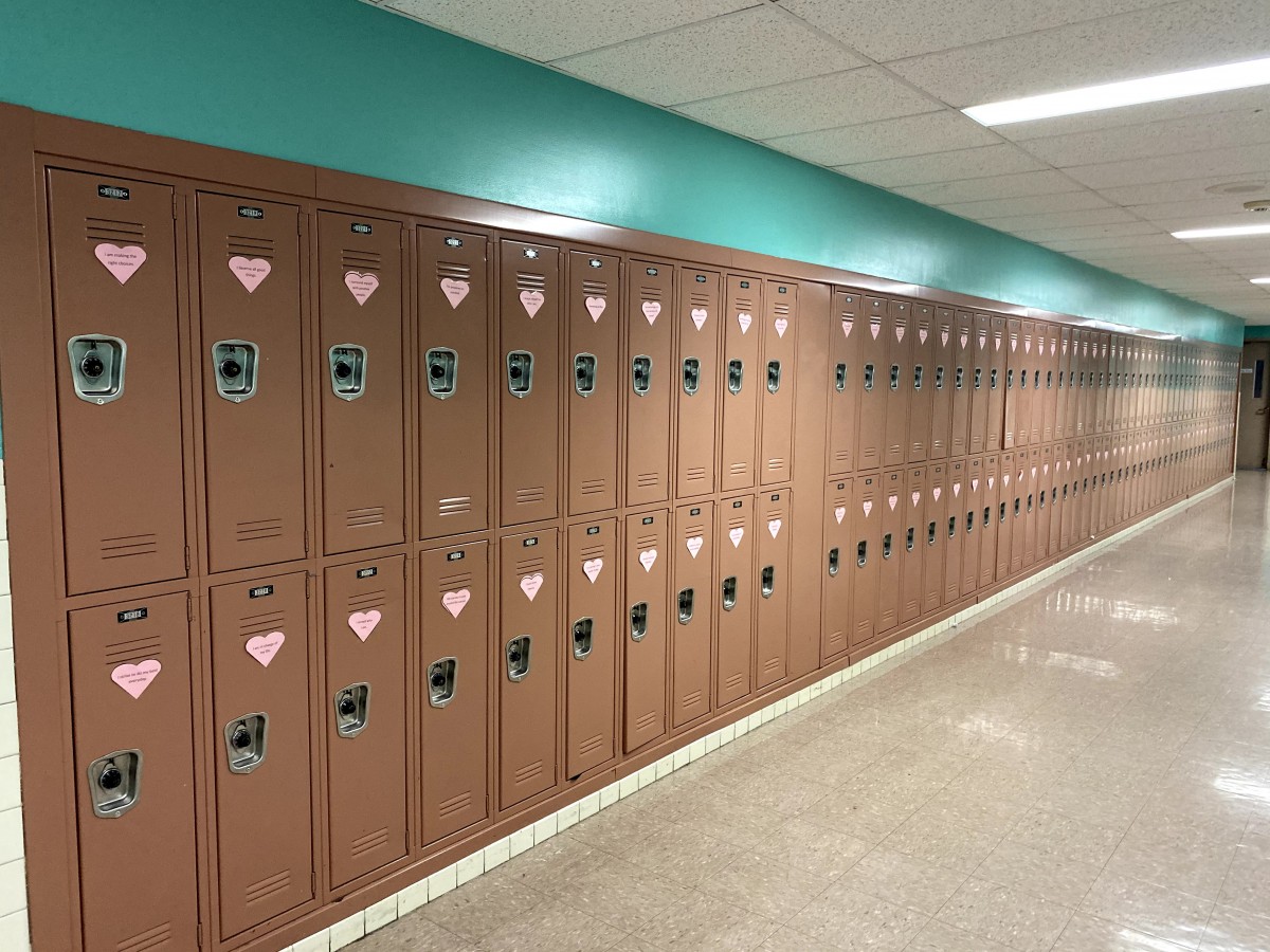 Row of lockers with affirmations on it.