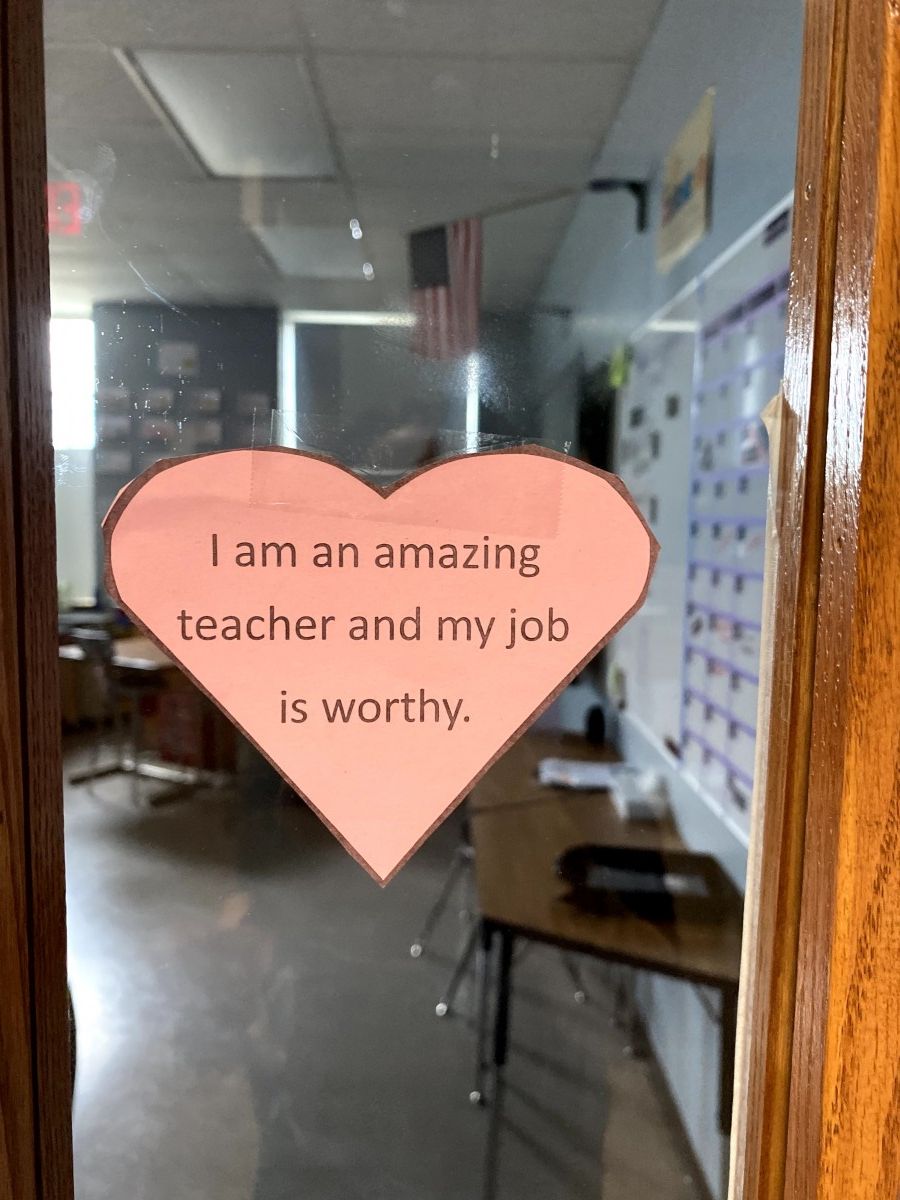 Affirmation in a heart stuck to a locker.