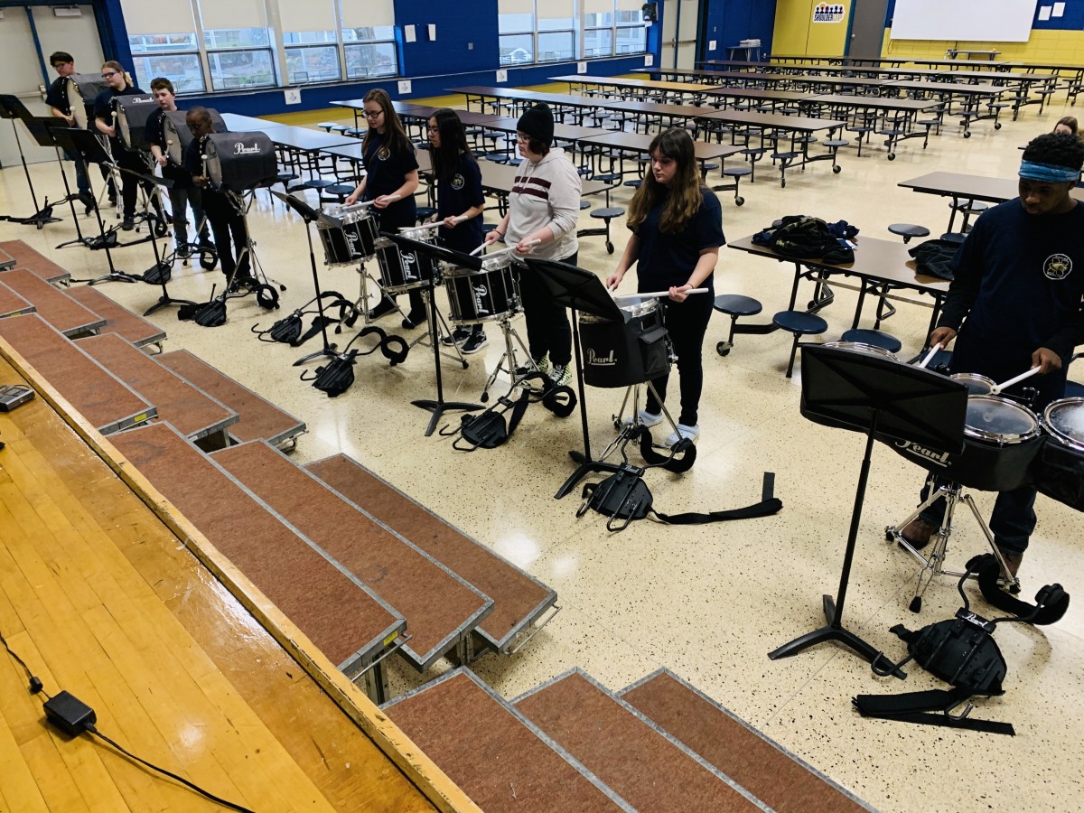 Students practicing with their drums.