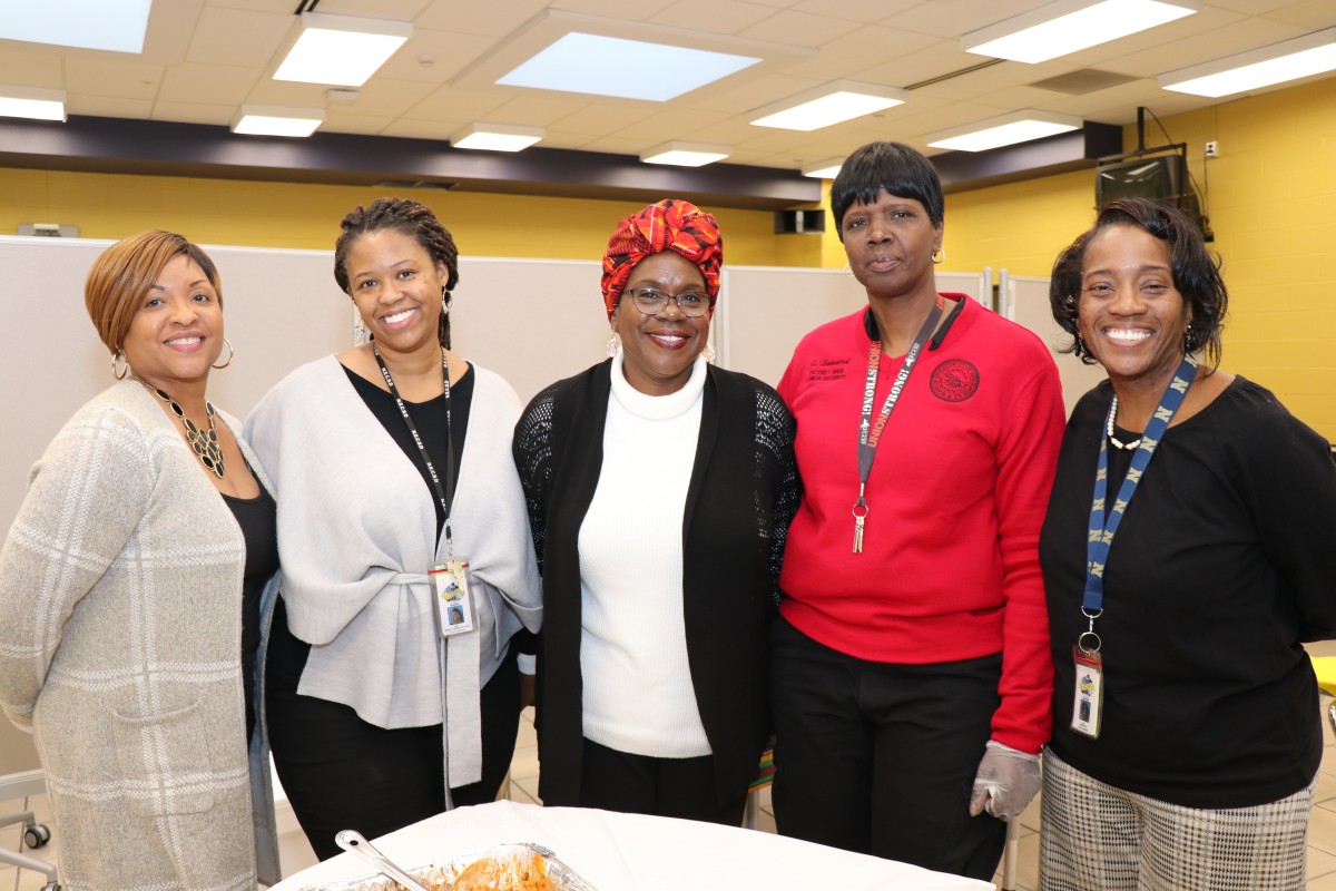 Guidance counselor Ms. Pamela Bonsu, assistant prinicpal Ms. Carolyne Monereau-St. Louis, guidance counselor Ms. Tara Jones, security supervisor Ms. Joyce Howard, social worker Ms. Ada Campbell pose for a photo.