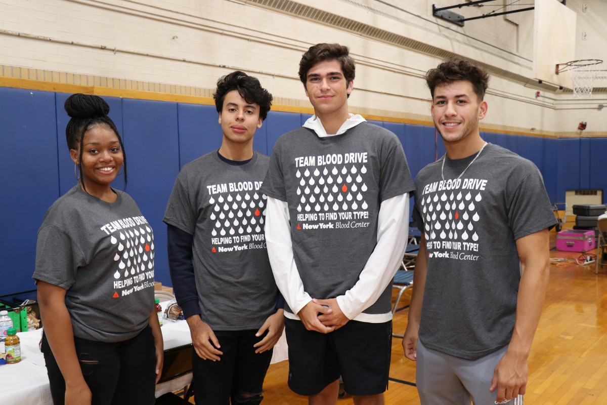 Volunteers pose for a photo.