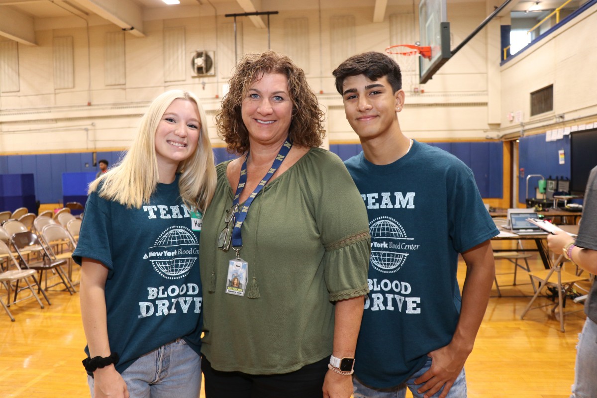 Volunteers pose for a photo.