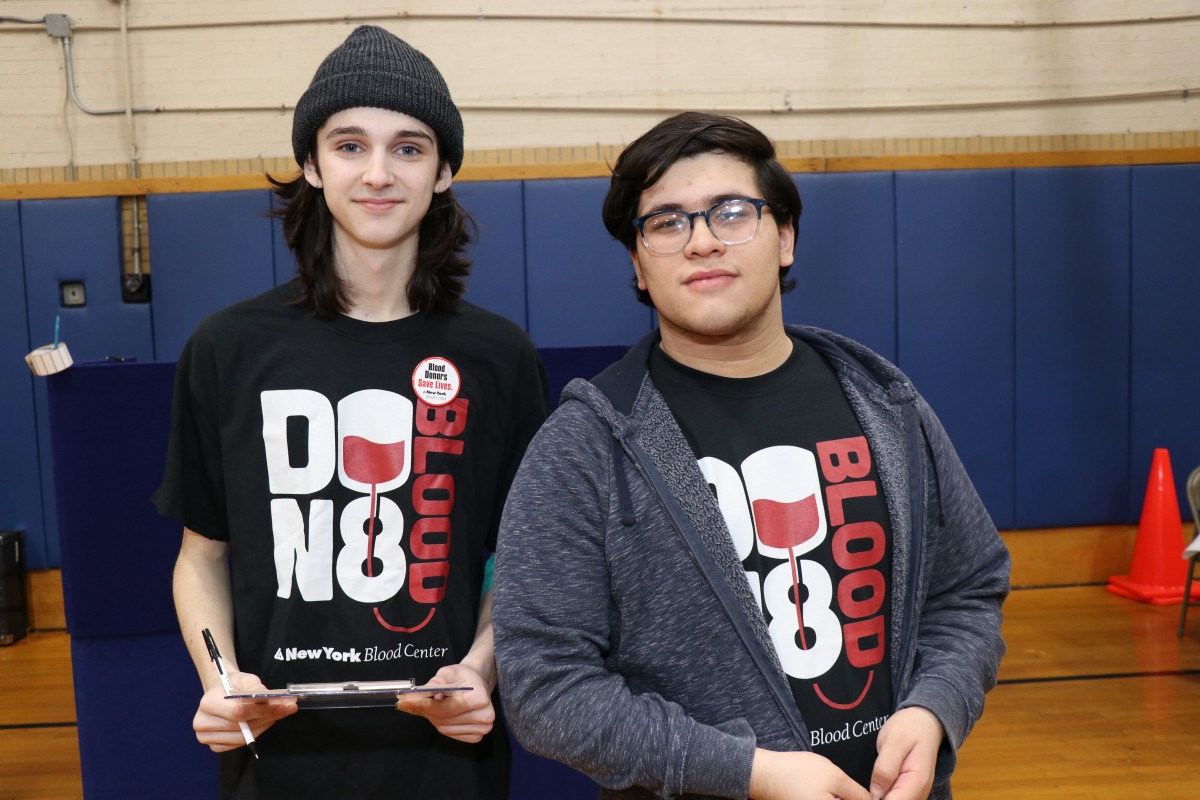 Student volunteers pose for a photo.