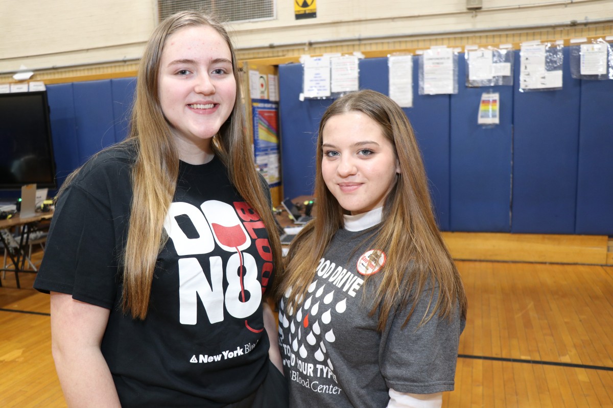 Student volunteers pose for a photo.