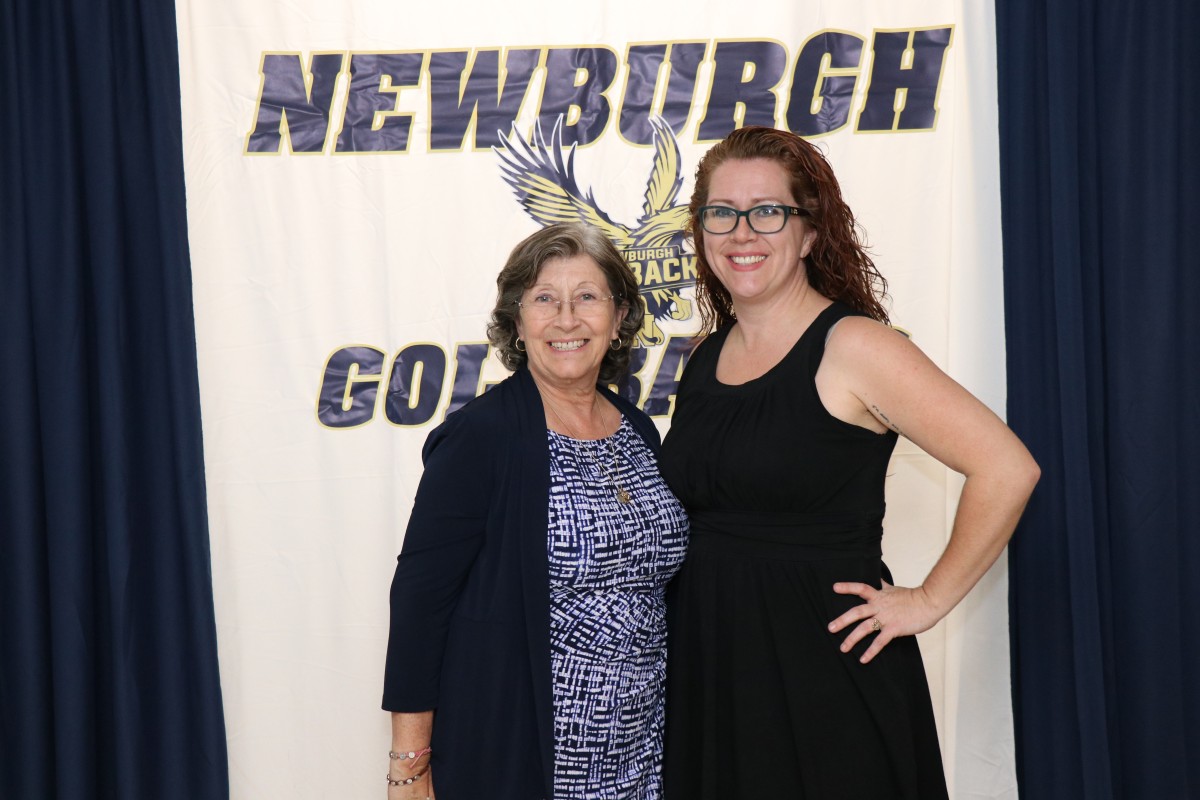 Students pose for a photo as they enter the dance.