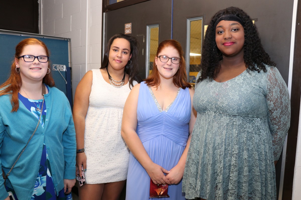 Students pose for photos at the dance.