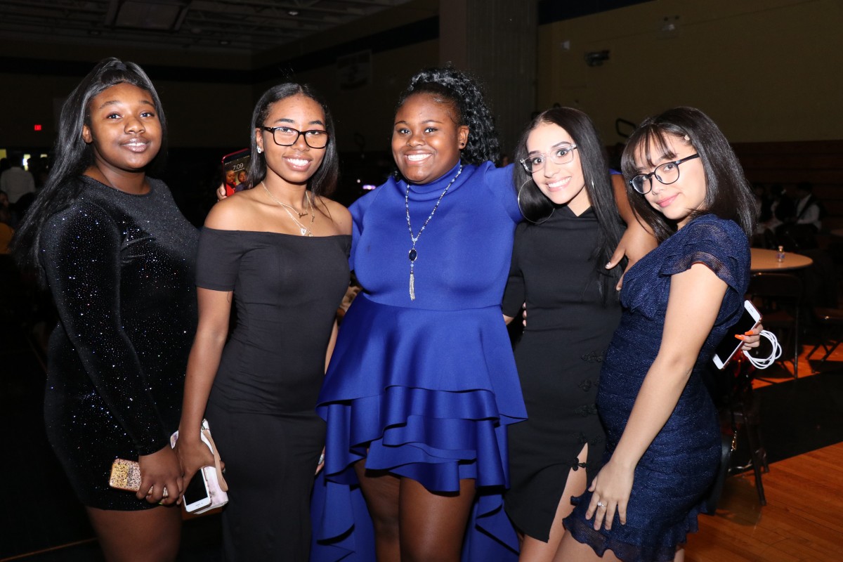 Students pose for photos at the dance.