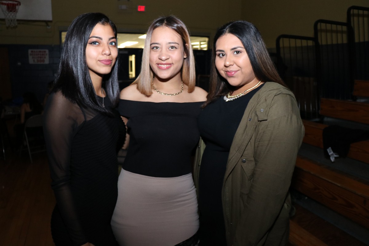 Students pose for photos at the dance.