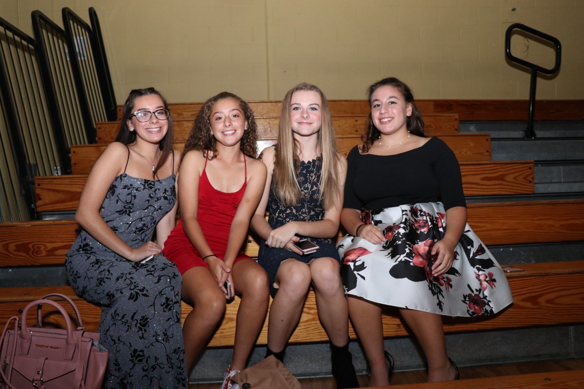 Students pose for photos at the dance.