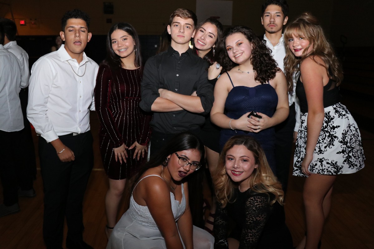 Students pose for photos at the dance.