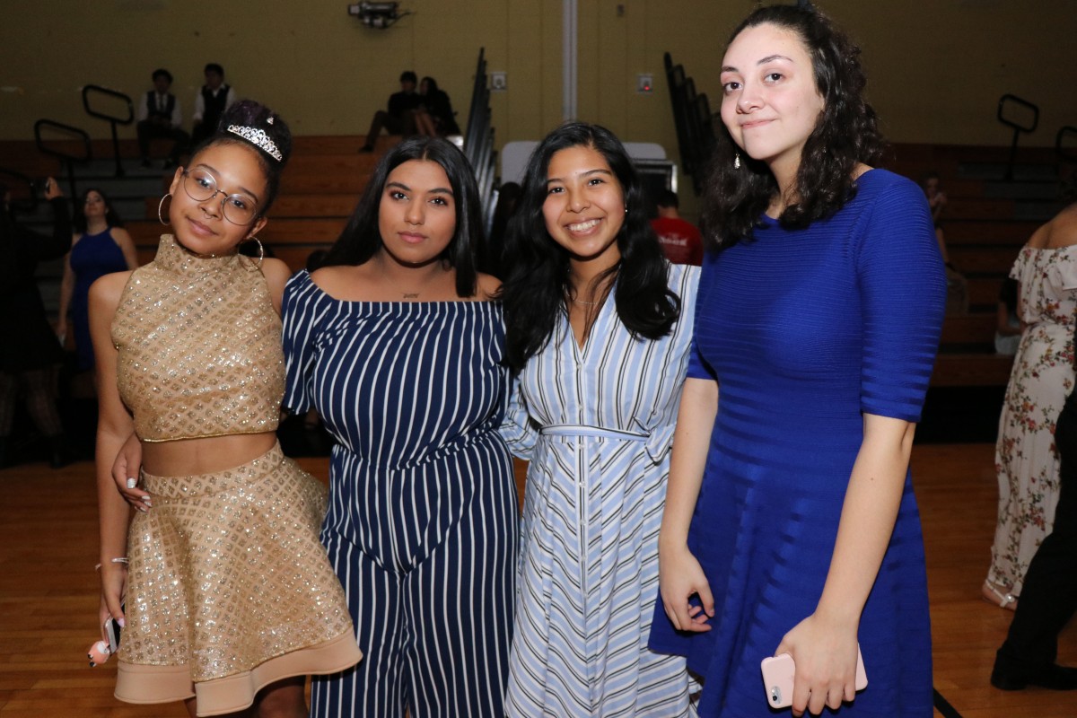 Students pose for photos at the dance.