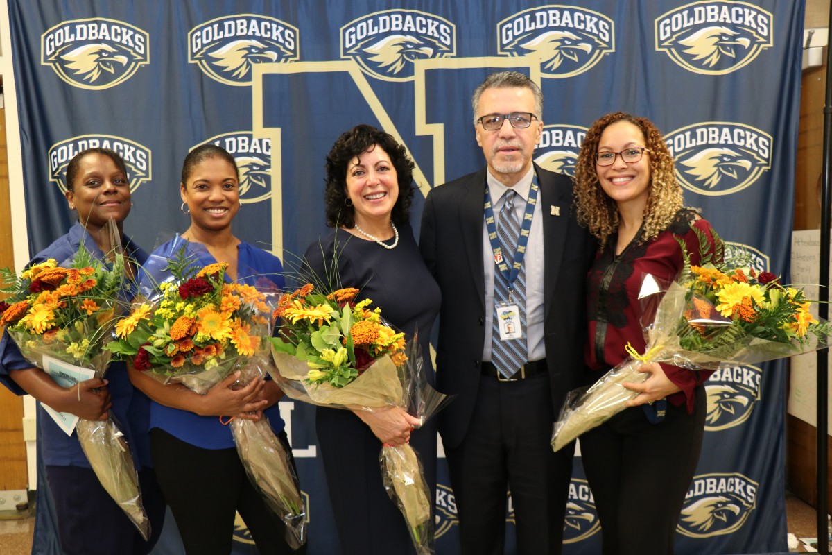 CNA teachers pose for a photo with Mr. Bill Kaplan, founder of the Newburgh Armory Unity Center.