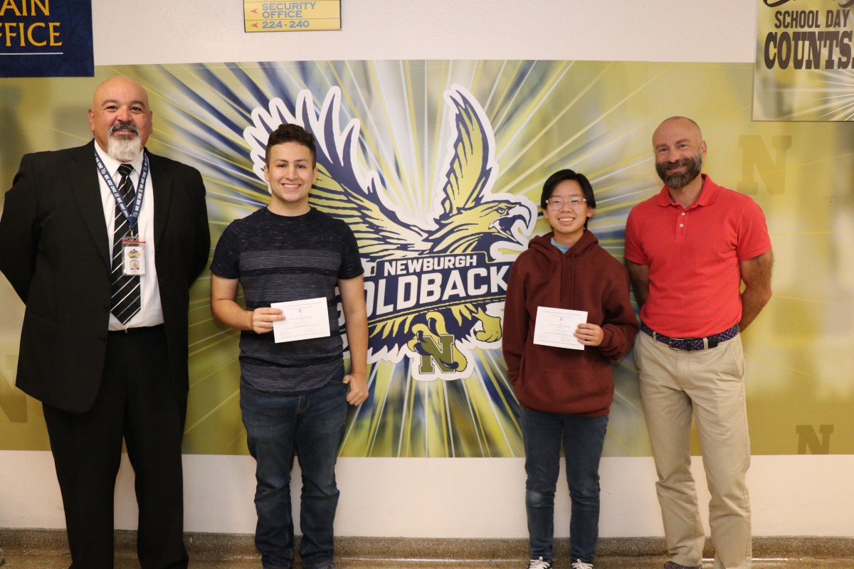 Pictured from left to right: Mr. Raul Rodriguez, principal of NFA Main Campus, Commended Student recipients Esteban Speedling and Kathryn Tramm, and school counselor Mr. Tom Hill.