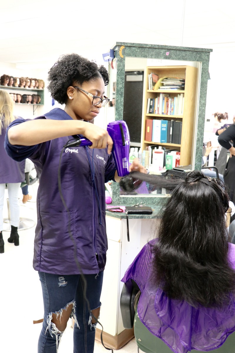 Student blow dries