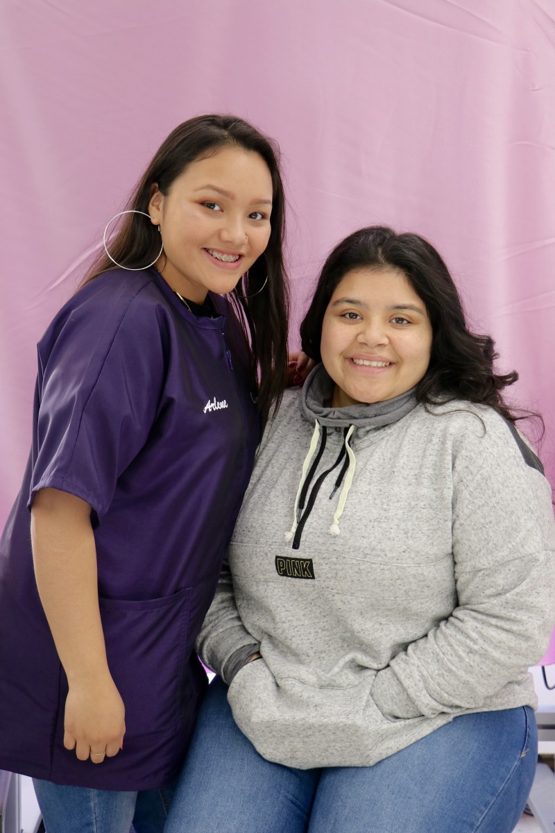 Students pose with final hair product