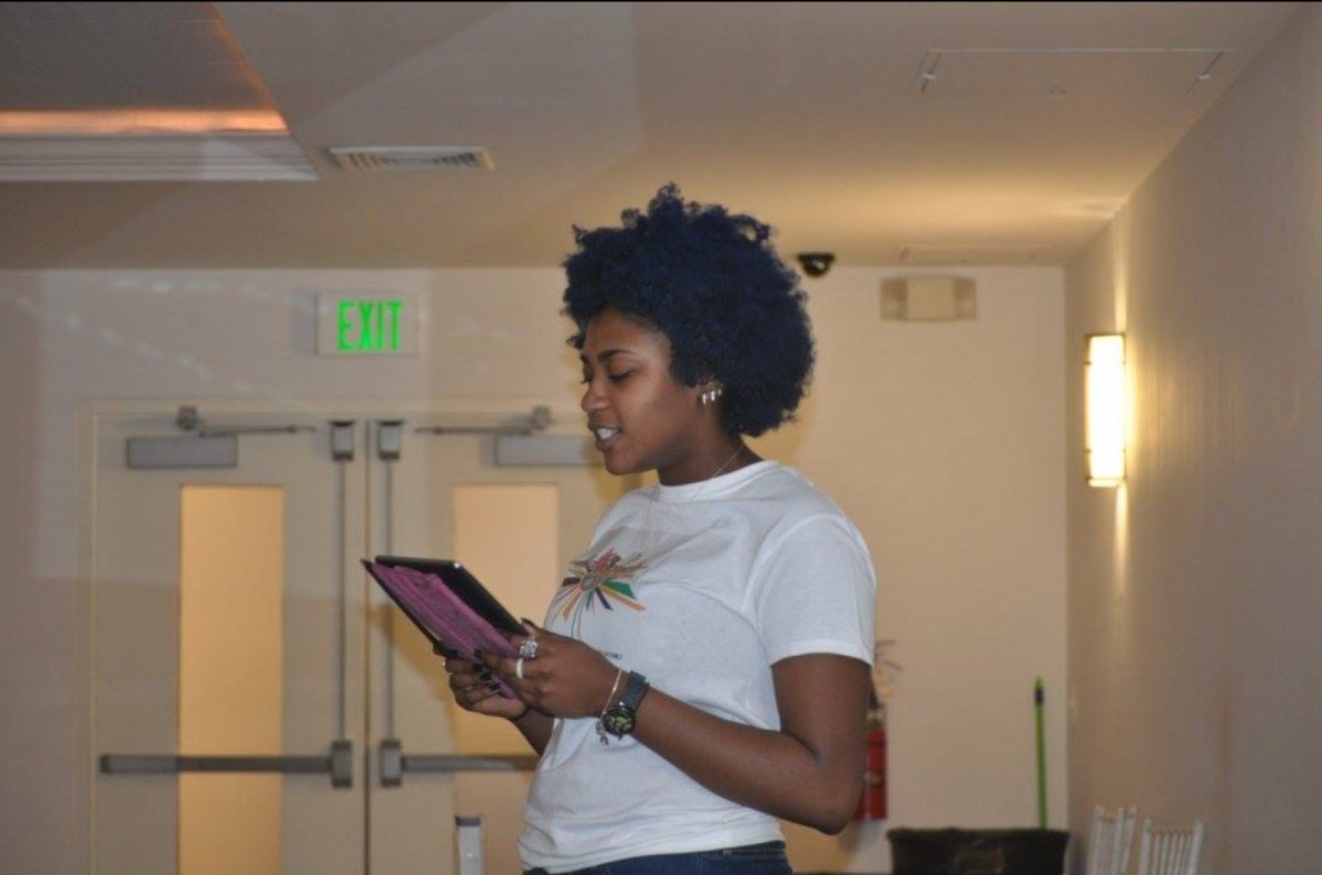 Ms. McLymore speaking at one of her events
