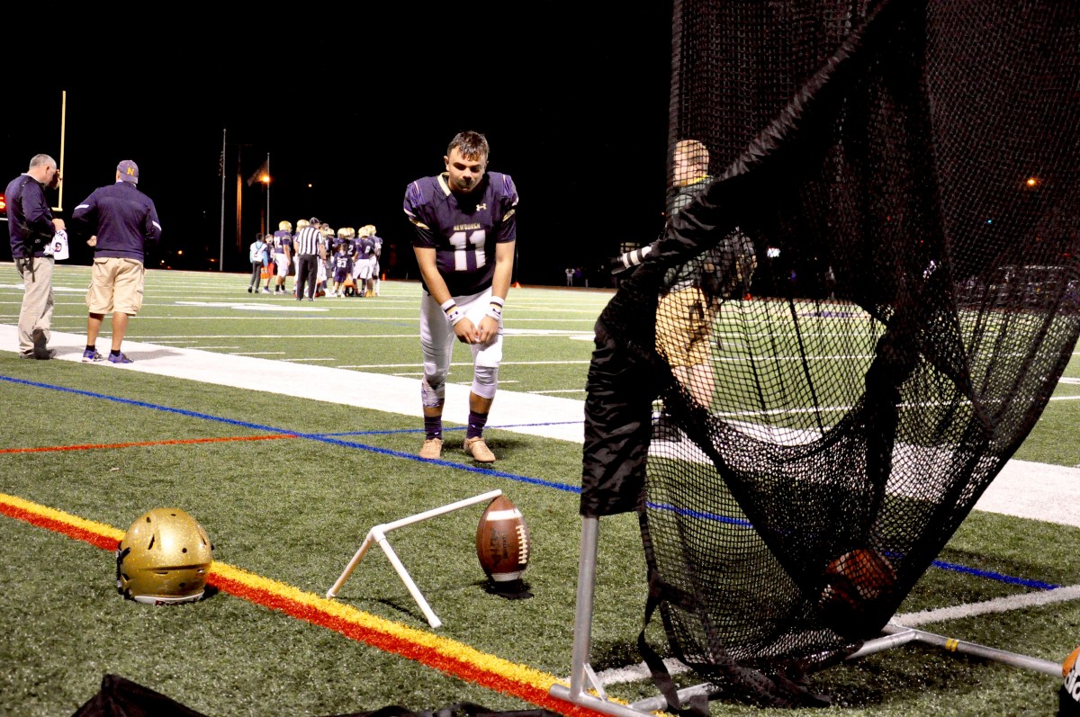 Pete Matthews warms up for his career kick