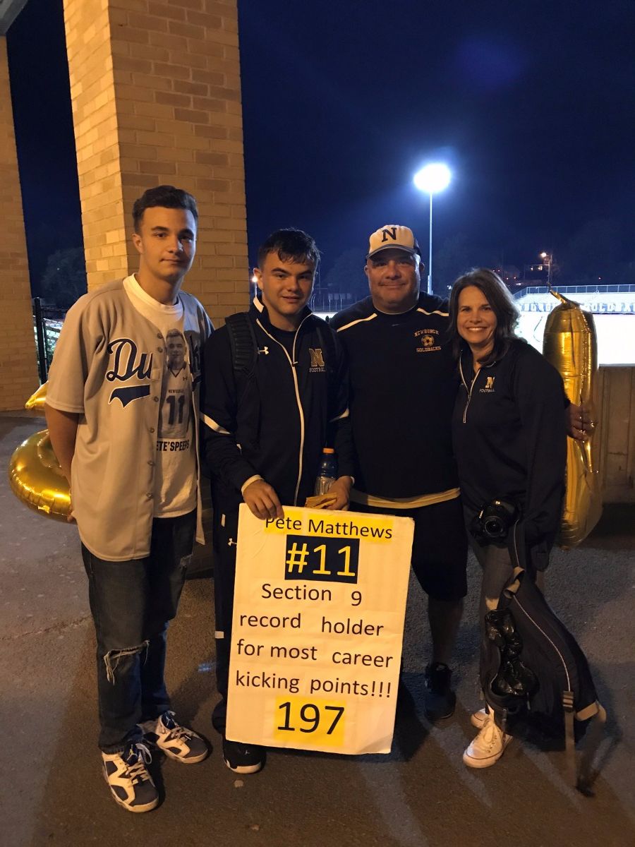 Pete Matthews poses with his family after breaking a career kicking record. Photo courtesy of: Mrs. Zoe Matthews.