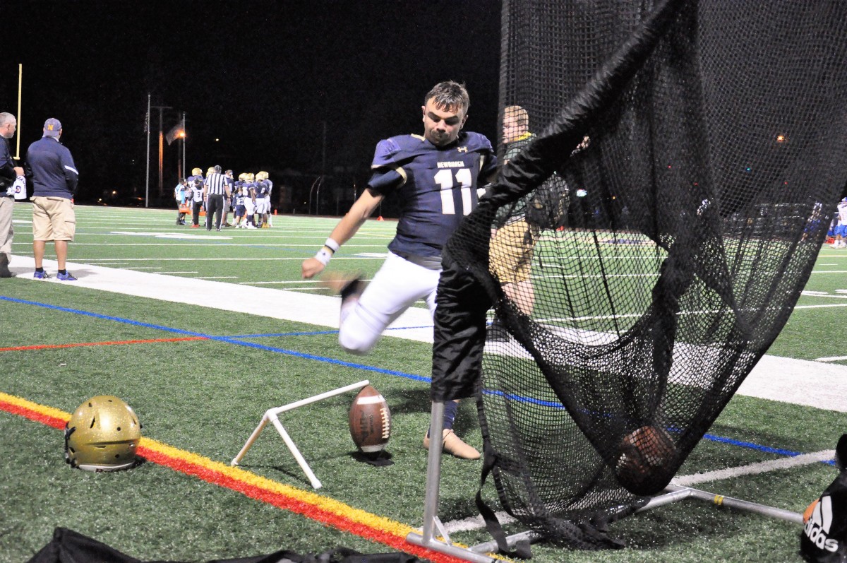 Pete Matthews warms up for his career kick