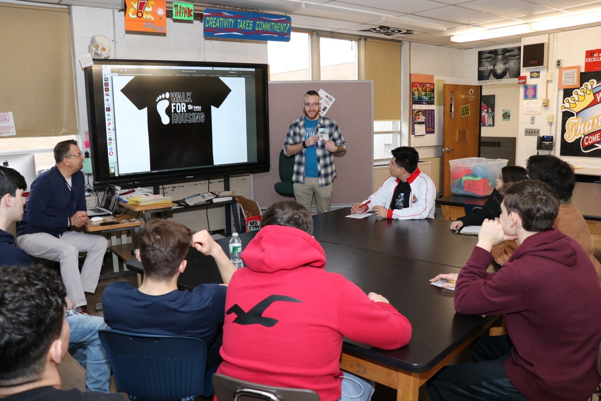 Students listen to the presentation from Mr. Chasteen and teacher Mr. Gebhardt.