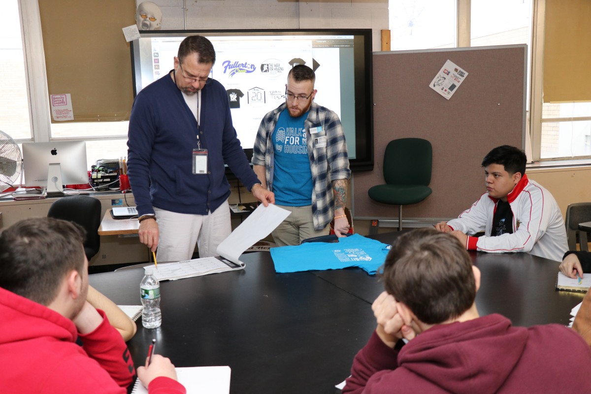 Students listen to the presentation from Mr. Chasteen and teacher Mr. Gebhardt.