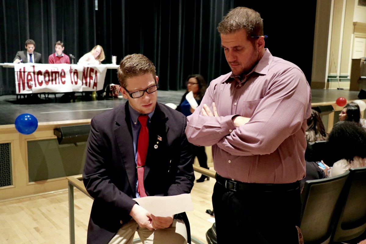 11th grader, Brandon speaks with teacher about strategy