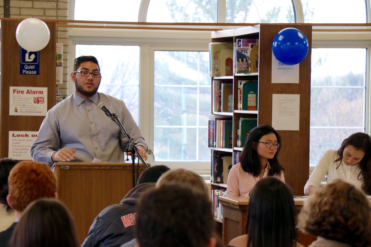 Cristos, a senior gives his speech during his mock campaign