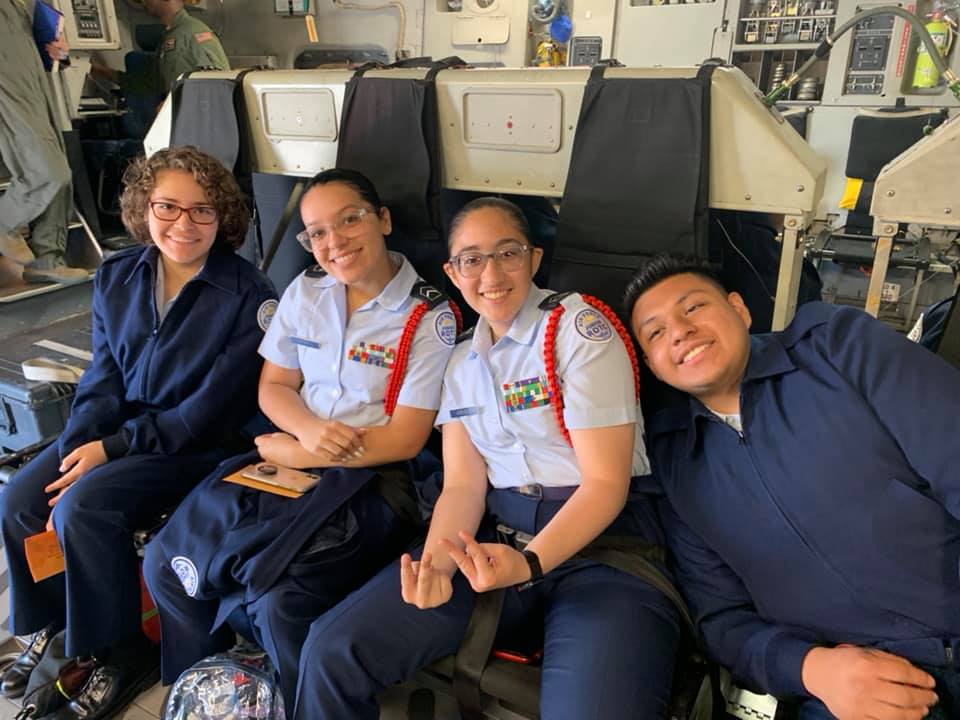 Students sit together on flight.