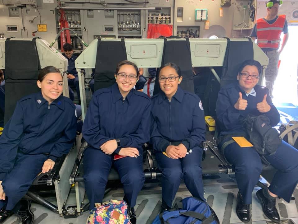 Students sit together on flight.