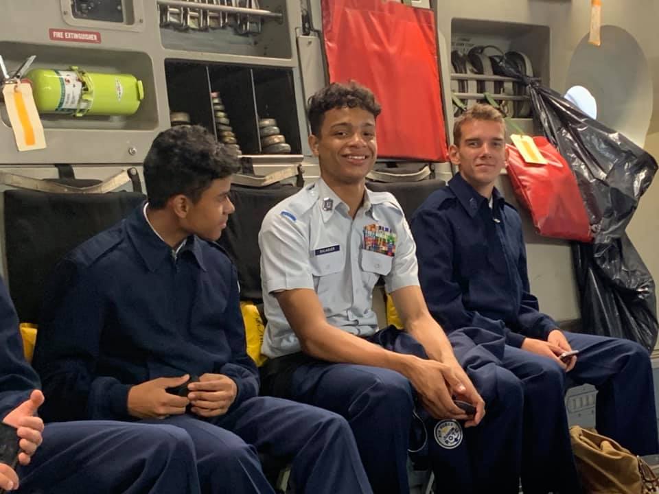 Students sit together on flight.