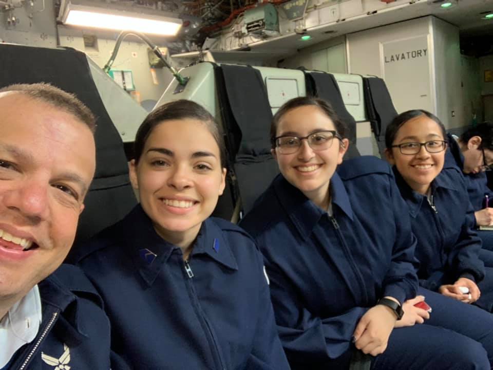 Students sit together on flight.