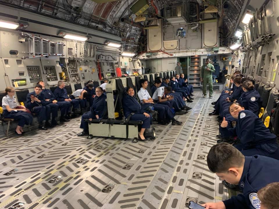 Students sit together on flight.