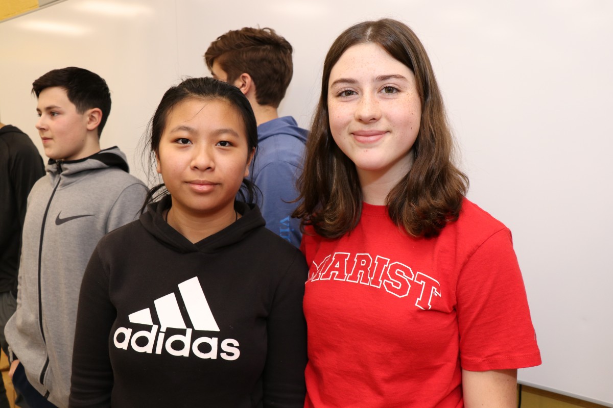 Student mentor groups pose for a photo.