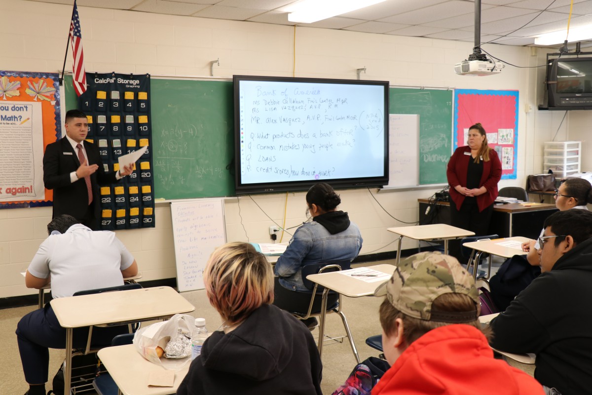 Representative speaks to the class.