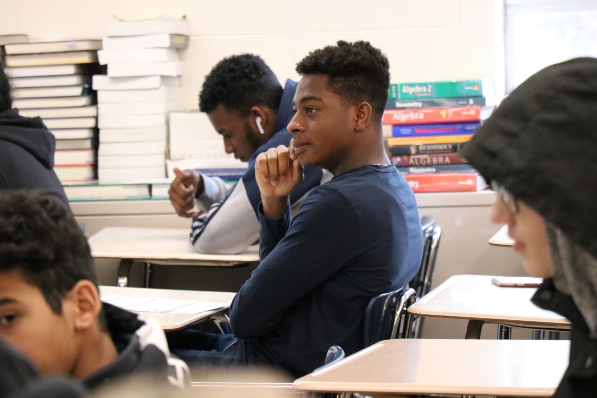 Student listening to presentation.