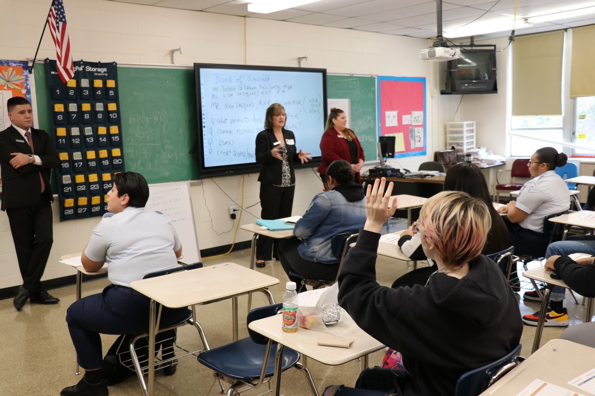 Representative speaks to the class.