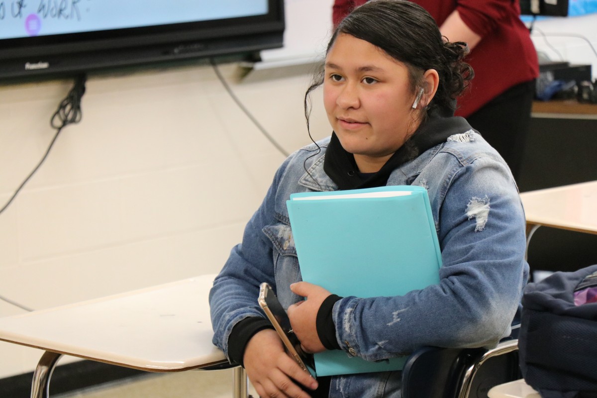 Student listening to presentation.