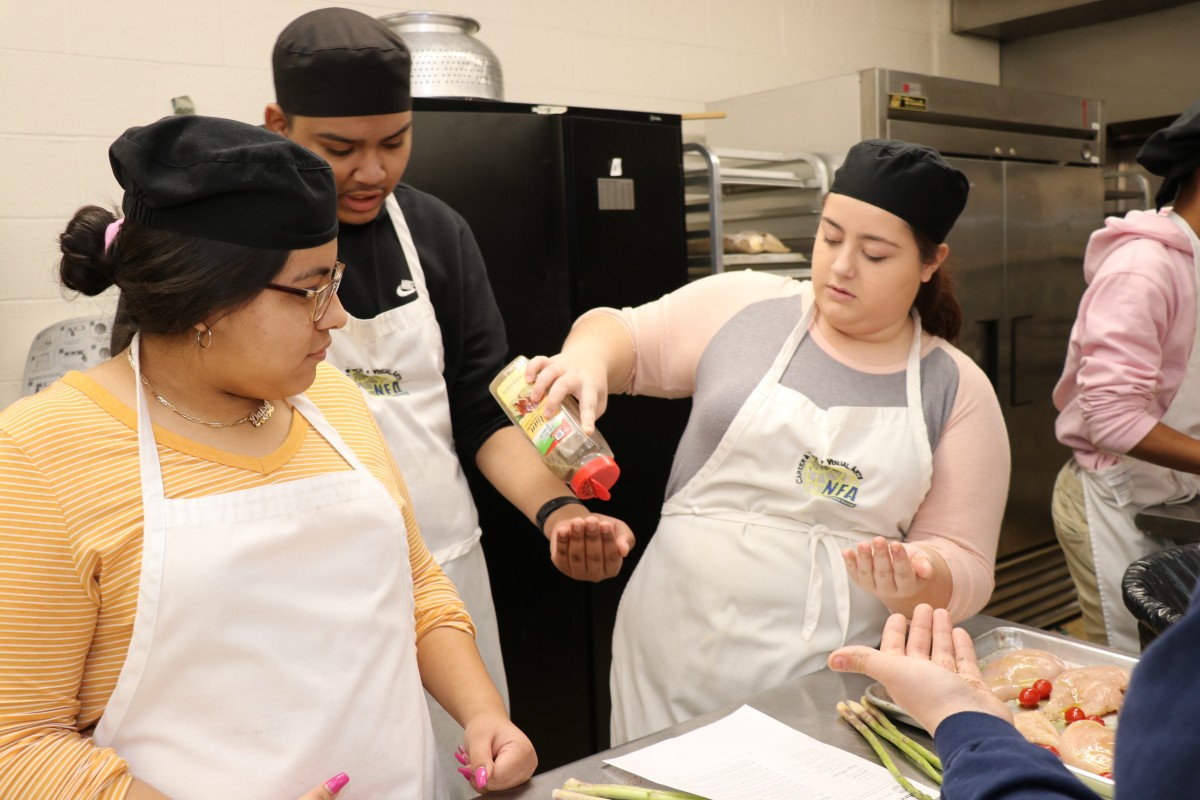 Students preparing a meal.