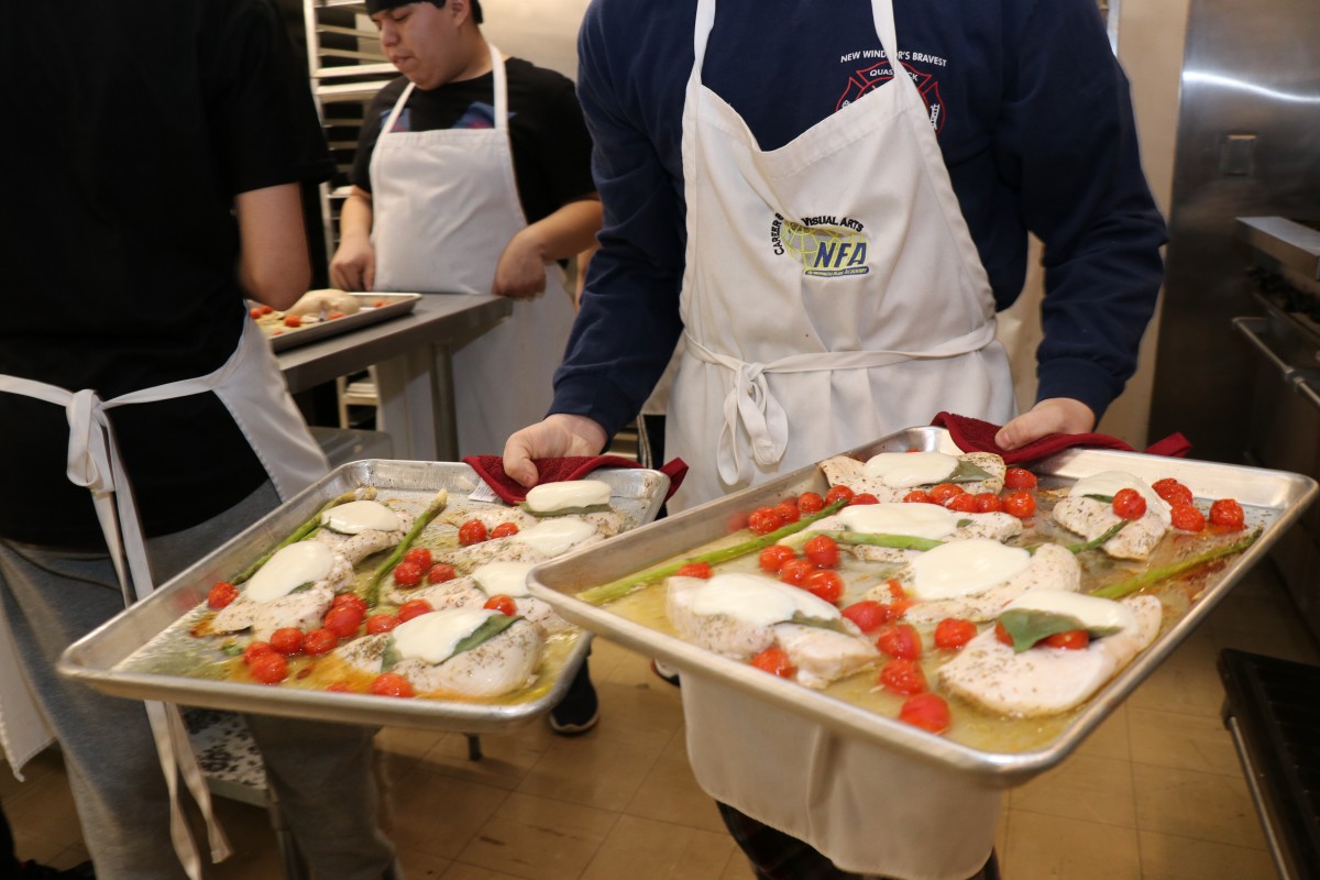 Students preparing a meal.