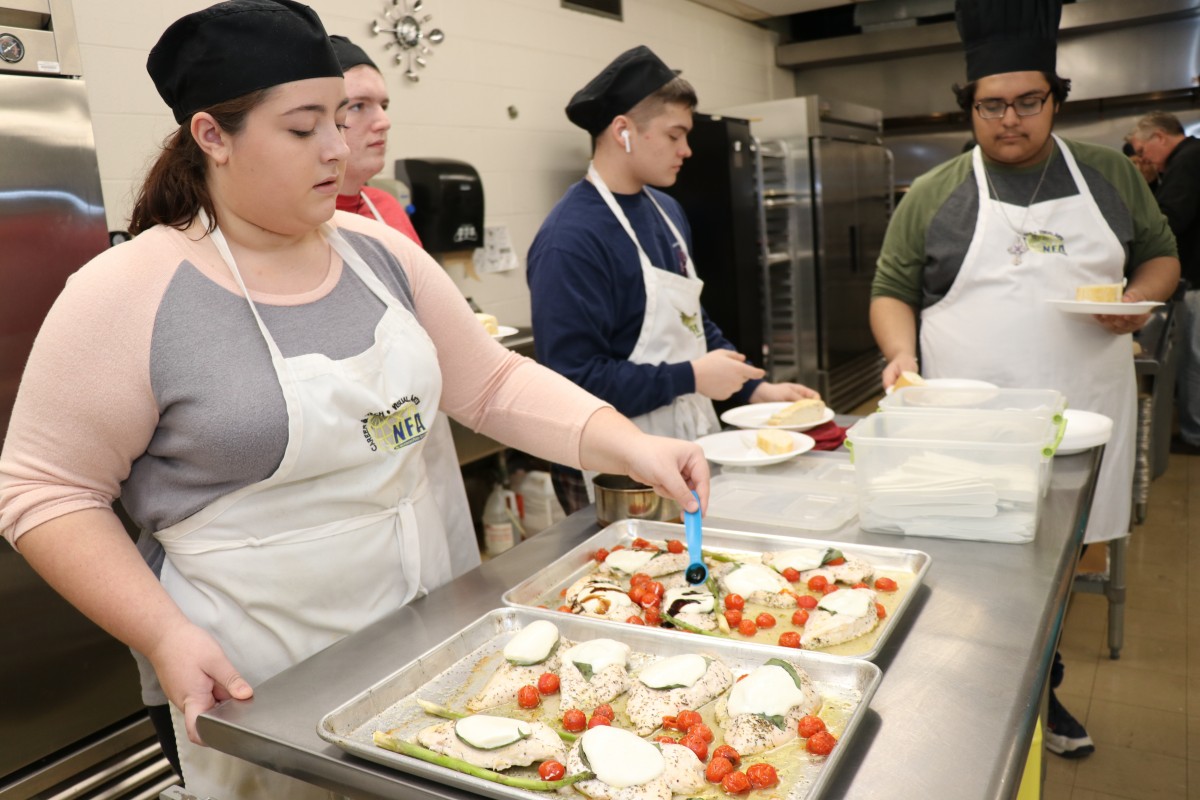 Students preparing a meal.